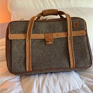 Vintage Hartman carry-on travel bag, Tweed with leather trim and brass hardware.